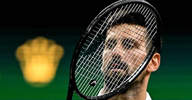(250702) -- LONDON, July 2, 2025 -- Novak Djokovic reacts during the men s singles first round match between Novak Djokovic of Serbia and Alexandre Muller of France at the Wimbledon Tennis Championships in London, Britain, July 1, 2025. ) (SP)BRITAIN-LONDON-TENNIS-WIMBLEDON-MEN S SINGLES LixYing 