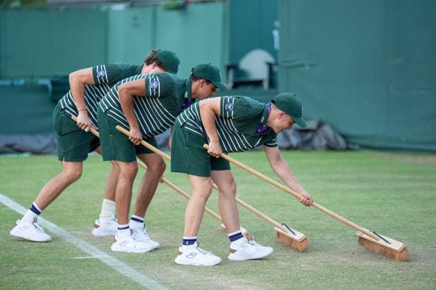2025-07-01 Wimbledon 2025 LONDON, ENGLAND - JULY 1: court maintenance, Court attendants during Wimbledon 2025 at All England Lawn Tennis & Croquet Club on July 1, 2025 in London, England. London All England Lawn Tennis & Croquet Club England Content not available for redistribution in The Netherlands directly or indirectly through any third parties. Copyright: xMarleenxFouchierx