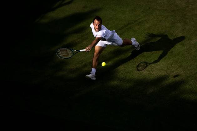 250701 Hugo Gaston of France competes in a first round singles tennis match during day 2 of Wimbledon on July 1, 2025 in London Photo Petter Arvidson BILDBYRAN kod PA PA1045 tennis wimbledon day 2 bbeng topx  Copyright: PETTERxARVIDSON BB250701PA085
