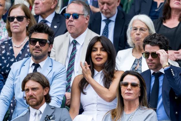 250702 Dominic Cooper, Priyanka Chopra Jonas and Nick Jonas in the stands during day 3 of Wimbledon on July 2, 2025 in London Photo Petter Arvidson BILDBYRAN kod PA PA1047 tennis wimbledon day 3 bbeng  Copyright: PETTERxARVIDSON BB250702PA015