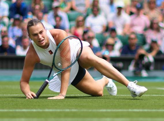 Wimbledon Championships 2025 AELTC, Day Two, London, UK - 02 07 2025 Aryna Sabalenka slips during her second round match against Marie Bouzkova (CZE) in the 2025 Wimbledon Championships London Wimbledon London GBR, UK NEWSPAPERS OUT Copyright: xMarkxGreenwoodx