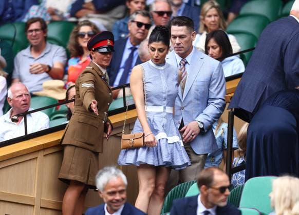 Wimbledon Championships 2025 AELTC, Day Two, London, UK - 02 07 2025 Former Professional Wrestler John Cena and his wife Shay are directed to their seats in the Royal Box at Wimbledon on day three of the Championships London Wimbledon London GBR, UK NEWSPAPERS OUT Copyright: xMarkxGreenwoodx