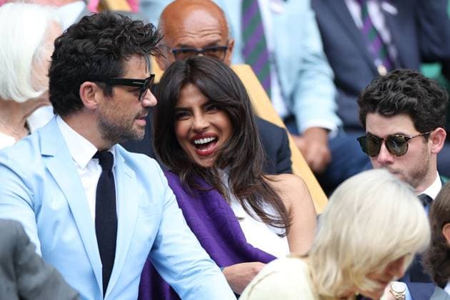 July 2, 2025, London, Celestynow, England: DOMINIC COOPER PRIYANKA CHOPRA NICK JONAS in the Royal Box during the match A. Sabalenka against M. Bouzkova in the second round of Championships 2025 at Wimbledon AELTC in London. London England - ZUMAc278 20250702_zsp_c278_051 Copyright: xMarcinxCholewinskix