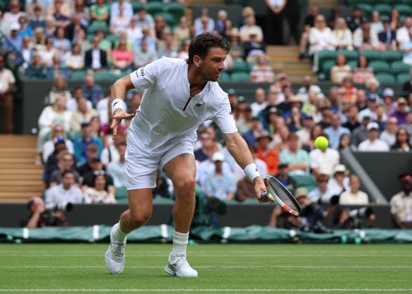 2nd July 2025; All England Lawn Tennis and Croquet Club, London, England; Wimbledon Tennis Tournament, Day 3; Cameron Norrie (GBR) with a forehand shot to Frances Tiafoe (FRA)  ActionPlus12807907 JohnxPatrickxFletcher