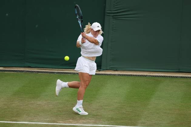 2nd July 2025; All England Lawn Tennis and Croquet Club, London, England; Wimbledon Tennis Tournament, Day 3; Sonay Kartal (GBR) with a backehand shot to Viktoriya Tomova (HUN)  ActionPlus12807876 JohnxPatrickxFletcher