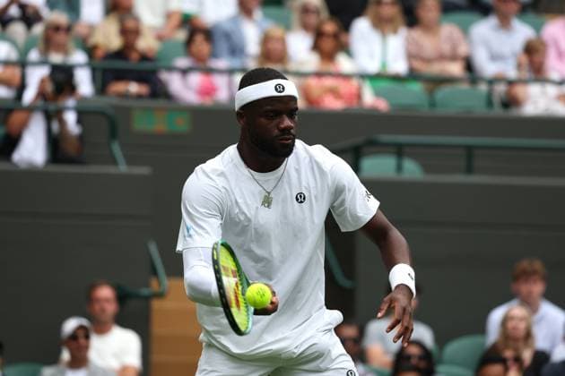 2nd July 2025; All England Lawn Tennis and Croquet Club, London, England; Wimbledon Tennis Tournament, Day 3; Frances Tiafoe (FRA) with a forehand shot to Cameron Norrie (GBR)  ActionPlus12807851 JohnxPatrickxFletcher