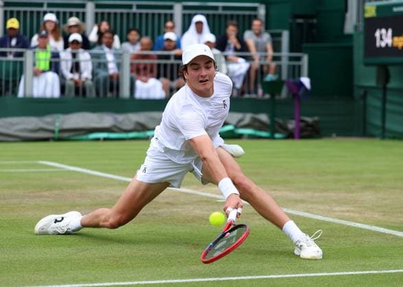 2nd July 2025; All England Lawn Tennis and Croquet Club, London, England; Wimbledon Tennis Tournament, Day 3; Joao Fonseca (BRA) with a backhand shot to Jenson Brooksby (USA)  ActionPlus12807913 JohnxPatrickxFletcher