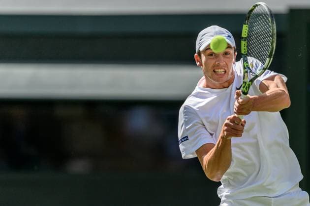250702 Oliver Tarvet of Great Britain competes in a second round singles tennis match during day 3 of Wimbledon on July 2, 2025 in London Photo Petter Arvidson BILDBYRAN kod PA PA1047 tennis wimbledon day 3 bbeng  Copyright: PETTERxARVIDSON BB250702PA073