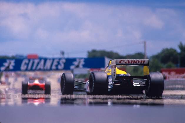 1989 French Grand Prix pictures Nigel Mansell in the Williams FW11B Renault and Mclaren at The 1989 French Grand Prix Formula One motor race held at Paul Ricard on 9 July 1989 On the Mistral Straight with the heat causing mirrored reflections on the track British racing driver, known for winning both the Formula One World Championship, WM, Weltmeisterschaft in 1992 and the CART Indy Car World Series in 1993, holding both titles simultaneously. Raced with the Ferrari team, Lotus, notably winning the 1992 championship with Williams Copyright: xMarkxNewcombex