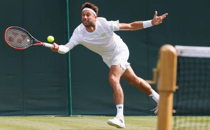 Belgian Sander Gille pictured in action during a doubles tennis match with Belgian-Indian pair Gille - Bopanna against German pair Putz - Krawietz, in the first round of the men s doubles at the 2025 Wimbledon grand slam tournament, Wednesday 02 July 2025 at the All England Tennis Club, in South-West London, Britain. BENOITxDOPPAGNE  x128277468x