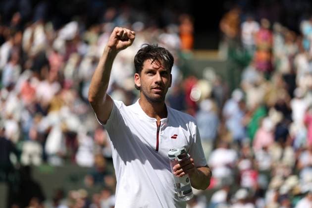 2nd July 2025; All England Lawn Tennis and Croquet Club, London, England; Wimbledon Tennis Tournament, Day 3; Cameron Norrie (GBR) raises his fist to the spectators inside Court One after defeating Frances Tiafoe (FRA) by three sets to one to reach the next round  ActionPlus12807947 JohnxPatrickxFletcher