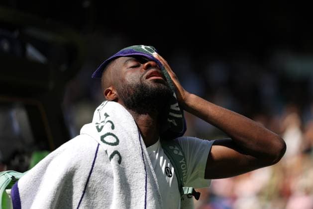2nd July 2025; All England Lawn Tennis and Croquet Club, London, England; Wimbledon Tennis Tournament, Day 3; A dejected Frances Tiafoe (FRA) walking out of Court Number One after losing to Cameron Norrie (GBR) by three sets to one  ActionPlus12807948 JohnxPatrickxFletcher