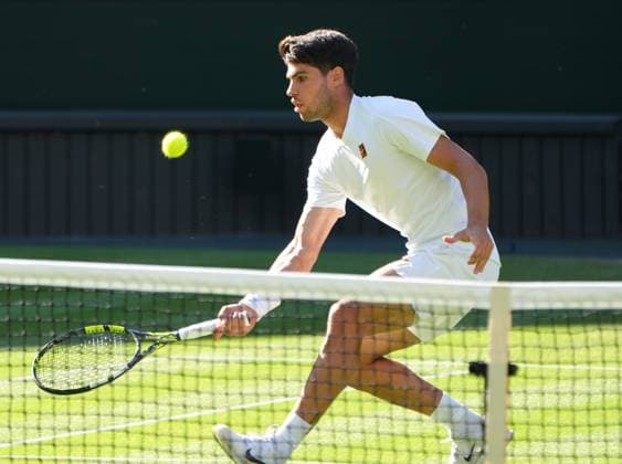 Tennis - 2025 Wimbledon Championships - Men™s Singles - Round Two - Oliver ˜Ollie™ Tarvet v Carlos Alcaraz All England Lawn Tennis & Croquet Club - Wednesday 2nd July 2025 Carlos Alcaraz of Spain 
