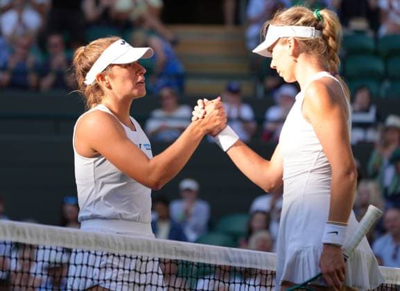 Tennis - 2025 Wimbledon Championships - Women™s Singles - Round Two - Katie Boulter v Solana Sierra All England Lawn Tennis & Croquet Club - Wednesday 2nd July 2025 Solana Sierra of Argentina consoles Katie Boulter after the match 