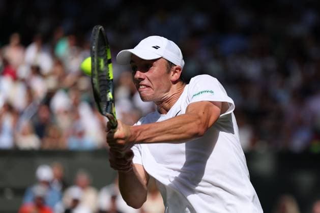 2nd July 2025; All England Lawn Tennis and Croquet Club, London, England; Wimbledon Tennis Tournament, Day 3; Oliver Tarvet (GBR) with a backhand shot to Carlos Alcaraz (ESP)  ActionPlus12807994 JohnxPatrickxFletcher