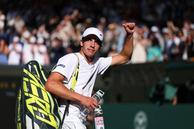 2nd July 2025; All England Lawn Tennis and Croquet Club, London, England; Wimbledon Tennis Tournament, Day 3; Oliver Tarvet (GBR) waves to the Wimbledon crowd at Centre Court after losing to Carlos Alcaraz (ESP) in straight sets  ActionPlus12808005 JohnxPatrickxFletcher