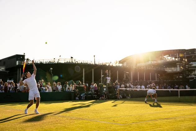 250702 AndrÃ Göransson of Sweden competes in a second round doubles tennis match during day 3 of Wimbledon on July 2, 2025 in London Photo Petter Arvidson BILDBYRAN kod PA PA1047 tennis wimbledon day 3 bbeng sverige  Copyright: PETTERxARVIDSON BB250702PA097