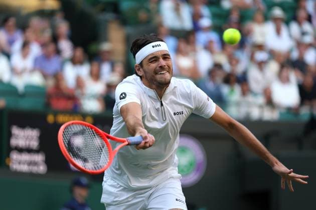 2nd July 2025; All England Lawn Tennis and Croquet Club, London, England; Wimbledon Tennis Tournament, Day 3; Taylor Fritz (USA) with a forehand shot to Gabriel Diallo (CAN)  ActionPlus12808045 JohnxPatrickxFletcher