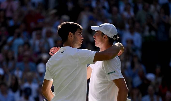 (250703) -- LONDON, July 3, 2025 -- Carlos Alcaraz (L) greets with Oliver Tarvet after during the men s singles second round match between Carlos Alcaraz of Spain and Oliver Tarvet of Britain at the Wimbledon Tennis Championships in London, Britain, July 2, 2025. ) (SP)BRITAIN-LONDON-TENNIS-WIMBLEDON-MEN S SINGLES LixYing 