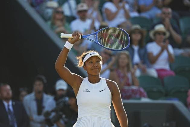 Tennis: Wimbledon championships Japan s Naomi Osaka acknowledges the crowd after beating Katerina Siniakova of the Czech Republic in the women s singles second round at the Wimbledon tennis tournament in London on July 2, 2025.  A14AA0004698909P
