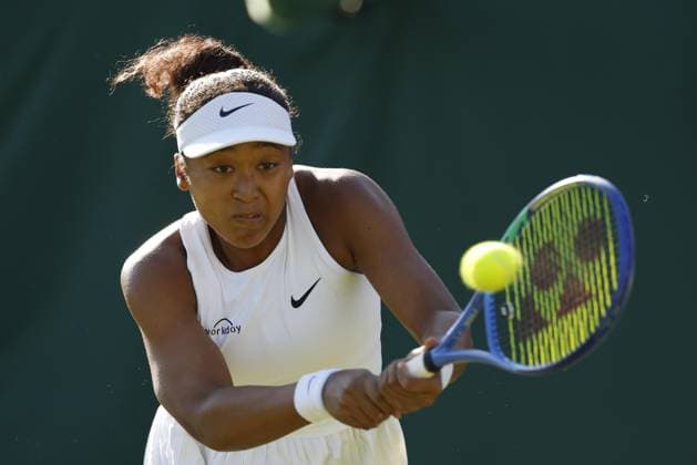 Tennis: Wimbledon championships Japan s Naomi Osaka plays against Katerina Siniakova of the Czech Republic in the women s singles second round at the Wimbledon tennis tournament in London on July 2, 2025.  A14AA0004698910P
