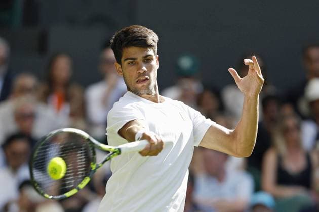 Tennis: Wimbledon championships Carlos Alcaraz of Spain plays against Oliver Tarvet of Britain in the men s singles second round at the Wimbledon tennis tournament in London on July 2, 2025.  A14AA0004698932P