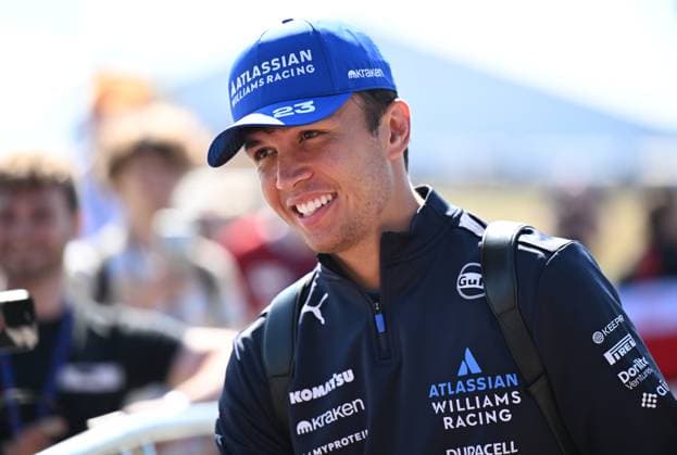 3rd July 2025; Silverstone Circuit, Northamptonshire, England; Formula 1 2025 Qatar Airways British F1 Grand Prix; Arrivals and Inspection Day; Alexander Albon of Williams poses for photos with fans on arrival at Silverstone  ActionPlus12808214 SimonxWest