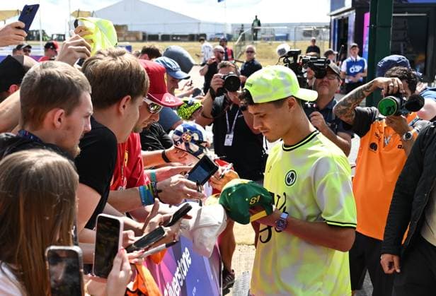 3rd July 2025; Silverstone Circuit, Northamptonshire, England; Formula 1 2025 Qatar Airways British F1 Grand Prix; Arrivals and Inspection Day; Lando Norris of McLaren signs autographs on arrival at Silverstone  ActionPlus12808252 SimonxWest