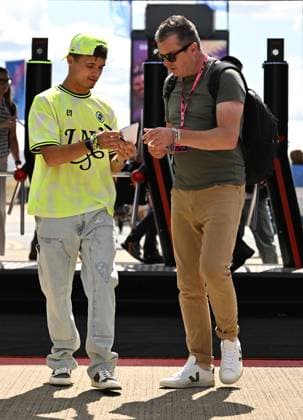 3rd July 2025; Silverstone Circuit, Northamptonshire, England; Formula 1 2025 Qatar Airways British F1 Grand Prix; Arrivals and Inspection Day; Lando Norris of McLaren signs autographs on arrival at Silverstone  ActionPlus12808255 SimonxWest