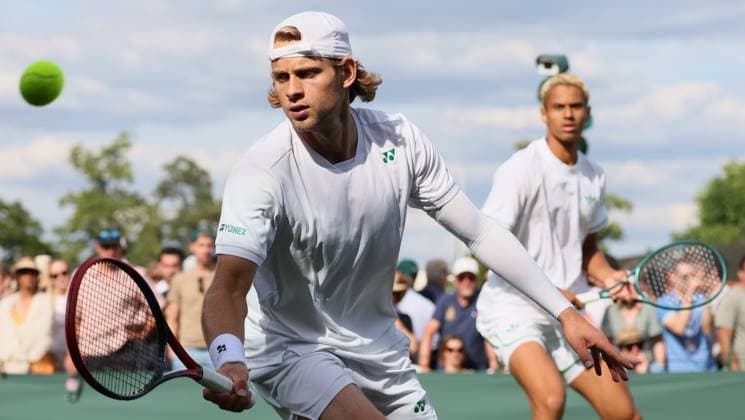 Belgian Zizou Bergs pictured in action during a doubles tennis match between French pair Doumbia-Reboul and Belgian-Canadian pair Bergs-Diallo, in the first round of the men s doubles at the 2025 Wimbledon grand slam tournament, Thursday 03 July 2025 at the All England Tennis Club, in South-West London, Britain. BENOITxDOPPAGNE  x128361093x