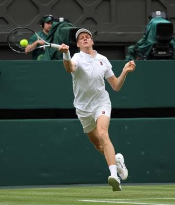 Italian Jannik Sinner plays a forehand in his second round match against Australia s Aleksandar Vukic on day four of the 2025 Wimbledon Championships in London on Thursday, June 03, 2025.  LON2025070362 HUGOxPHILPOTT