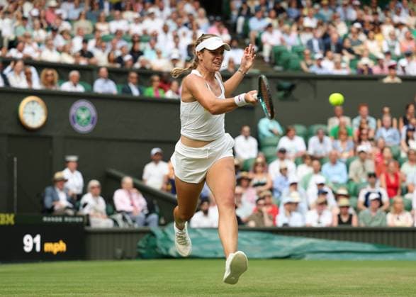 3rd July 2025; All England Lawn Tennis and Croquet Club, London, England; Wimbledon Tennis Tournament, Day 4; Caty McNally (USA) with a forehand shot to Iga Swiatek (POL)  ActionPlus12808513 JohnxPatrickxFletcher