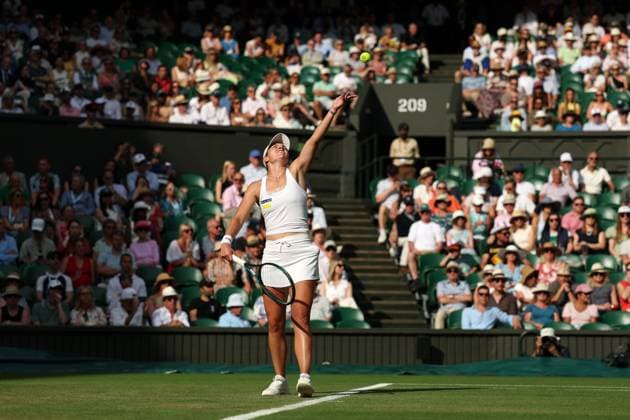 3rd July 2025; All England Lawn Tennis and Croquet Club, London, England; Wimbledon Tennis Tournament, Day 4; Caty McNally (USA) serves to Iga Swiatek (POL)  ActionPlus12808516 JohnxPatrickxFletcher