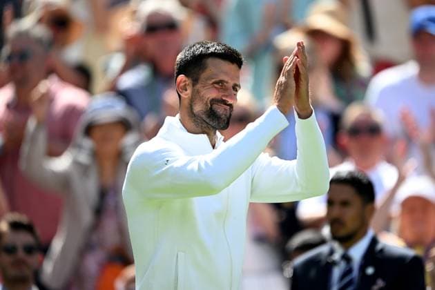 (250704) -- LONDON, July 4, 2025 -- Novak Djokovic reacts after the men s singles second round match between Novak Djokovic of Serbia and Daniel Evans of Britain at the Wimbledon Tennis Championships in London, Britain, July 3, 2025. ) (SP)BRITAIN-LONDON-TENNIS-WIMBLEDON-MEN S SINGLES ZhaoxDingzhe 