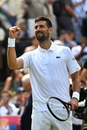 (250704) -- LONDON, July 4, 2025 -- Novak Djokovic reacts after the men s singles second round match between Novak Djokovic of Serbia and Daniel Evans of Britain at the Wimbledon Tennis Championships in London, Britain, July 3, 2025. ) (SP)BRITAIN-LONDON-TENNIS-WIMBLEDON-MEN S SINGLES ZhaoxDingzhe 