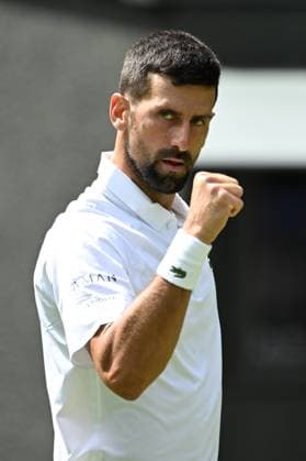 (250704) -- LONDON, July 4, 2025 -- Novak Djokovic reacts during the men s singles second round match between Novak Djokovic of Serbia and Daniel Evans of Britain at the Wimbledon Tennis Championships in London, Britain, July 3, 2025. ) (SP)BRITAIN-LONDON-TENNIS-WIMBLEDON-MEN S SINGLES ZhaoxDingzhe 