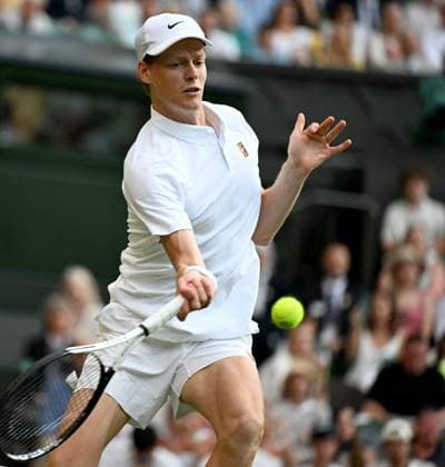 (250704) -- LONDON, July 4, 2025 -- Jannik Sinner hits a return during the men s singles second round match between Jannik Sinner of Italy and Aleksandar Vukic of Australia at the Wimbledon Tennis Championships in London, Britain, July 3, 2025. ) (SP)BRITAIN-LONDON-TENNIS-WIMBLEDON-MEN S SINGLES LixYing 