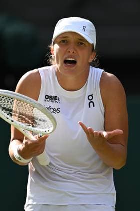 (250704) -- LONDON, July 4, 2025 -- Iga Swiatek reacts during the women s singles second round match between Iga Swiatek of Poland and Caty McNally of the United States at the Wimbledon Tennis Championships in London, Britain, July 3, 2025. ) (SP)BRITAIN-LONDON-TENNIS-WIMBLEDON-WOMEN S SINGLES ZhaoxDingzhe 