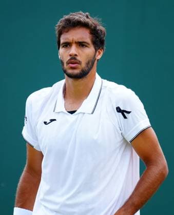 Francisco Cabral of Portugal wearing a black ribbon for Diogo Jota, during his Men s Doubles second round match Wimbledon Tennis Championships, Day 5, The All England Lawn Tennis and Croquet Club, London, UK - 04 Jul 2025London The All England Lawn Tennis and United Kingdom  Copyright: xJavierxGarcia Shutterstockx 15384469d