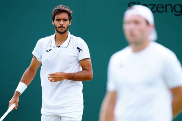 Francisco Cabral of Portugal wearing a black ribbon for Diogo Jota, during his Men s Doubles second round match Wimbledon Tennis Championships, Day 5, The All England Lawn Tennis and Croquet Club, London, UK - 04 Jul 2025London The All England Lawn Tennis and United Kingdom  Copyright: xJavierxGarcia Shutterstockx 15384469g