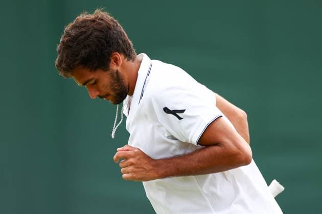 Francisco Cabral of Portugal wearing a black ribbon for Diogo Jota, during his Men s Doubles second round match Wimbledon Tennis Championships, Day 5, The All England Lawn Tennis and Croquet Club, London, UK - 04 Jul 2025London The All England Lawn Tennis and United Kingdom  Copyright: xJamesxMarsh Shutterstockx 15384470d