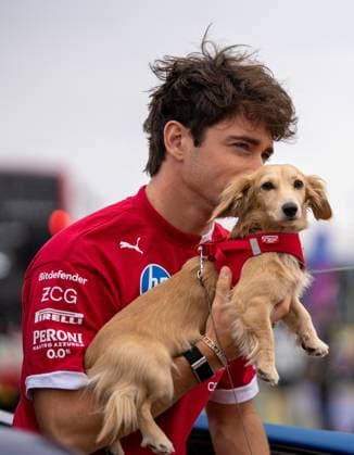 F1 British Grand Prix - UK Charles Leclerc (Mon) of Scuderia Ferrari 16 and Leo Leclerc (Dog) during the Formula 1 Qatar Airways British Grand Prix 2025 on Friday at the Silverstone International Circuit, Silverstone, England, UK on July 4, 2025. Photo by Antoine Lapeyre ABACAPRESS.COM Silverstone England United Kingdom  Copyright: xLapeyrexAntoine ABACAx