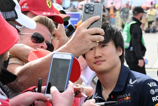 4th July 2025; Silverstone Circuit, Northamptonshire, England; Formula 1 2025 Qatar Airways British F1 Grand Prix; Free Practice Day; Yuki Tsunoda of Red Bull Racing poses for photos with fans on arrival at Silverstone  ActionPlus12808593 SimonxWest