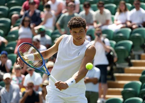 4th July 2025; All England Lawn Tennis and Croquet Club, London, England; Wimbledon Tennis Tournament, Day 5; Ben Shelton (USA) with a backhand shot to Rinky Hijikata (AUS)  ActionPlus12808736 JohnxPatrickxFletcher
