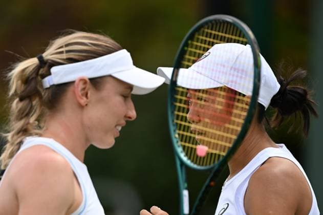 (250704) -- LONDON, July 4, 2025 -- Zhang Shuai (R) Ekaterina Alexandrova are seen during the women s doubles second round match between Zhang Shuai (China) Ekaterina Alexandrova (Russia) and Hozumi Eri (Japan) Aldila Sutjiadi (Indonesia) at the Wimbledon Tennis Championships in London, Britain, July 4, 2025. ) (SP)BRITAIN-LONDON-TENNIS-WIMBLEDON-WOMEN S DOUBLES LixYing 