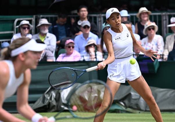 (250704) -- LONDON, July 4, 2025 -- Zhang Shuai (R) Ekaterina Alexandrova compete during the women s doubles second round match between Zhang Shuai (China) Ekaterina Alexandrova (Russia) and Hozumi Eri (Japan) Aldila Sutjiadi (Indonesia) at the Wimbledon Tennis Championships in London, Britain, July 4, 2025. ) (SP)BRITAIN-LONDON-TENNIS-WIMBLEDON-WOMEN S DOUBLES LixYing 