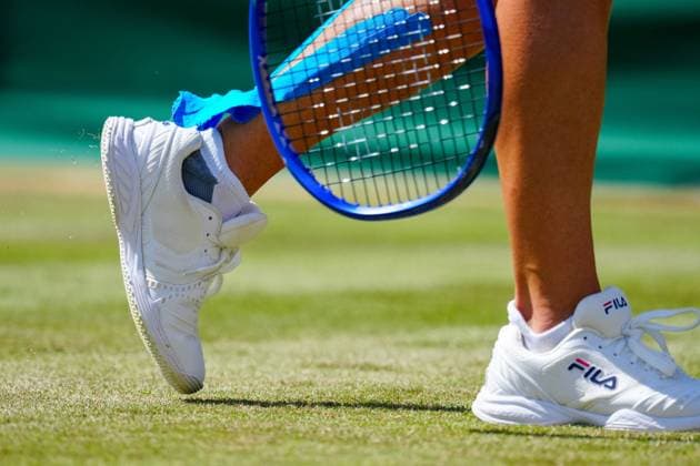 Kinesiology tape coming unstuck on the legs of Laura Siegemund Wimbledon Tennis Championships, Day 5, The All England Lawn Tennis and Croquet Club, London, UK - 04 Jul 2025London The All England Lawn Tennis and United Kingdom  Copyright: xJavierxGarcia Shutterstockx 15384469bx