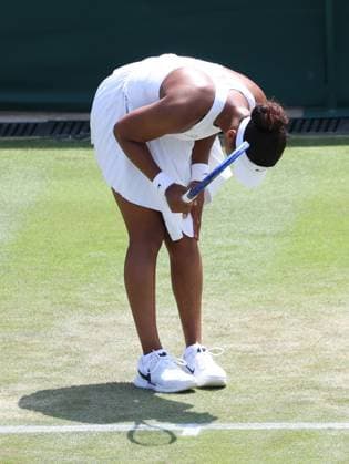 Japan s Naomi Osaka reacts in her third round match against Anastasia Pavlyuchenkova on day five of the 2025 Wimbledon Championships in London on Friday, June 04, 2025.  LON2025070415 HUGOxPHILPOTT