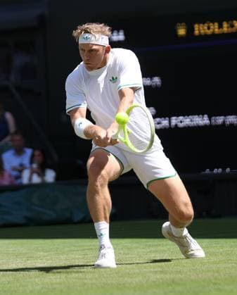 Spain s Alejandro Davidovich Fokina in his third round match against American Taylor Fritz on day five of the 2025 Wimbledon Championships in London on Friday, June 04, 2025.  LON2025070423 HUGOxPHILPOTT