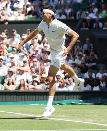 American Taylor Fritz serves in his third round match against Spain s Alejandro Davidovich Fokina on day five of the 2025 Wimbledon Championships in London on Friday, June 04, 2025.  LON2025070434 HUGOxPHILPOTT